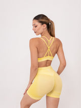 Fit Bunny Delta безшевен спортен екип с омбре ефект в жълт цвят. Бюстие с кръстосани презрамки и къс клин.