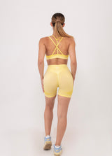 Fit Bunny Delta безшевен спортен екип с омбре ефект в жълт цвят. Бюстие с кръстосани презрамки и къс клин.