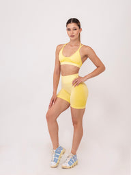 Fit Bunny Delta безшевен спортен екип с омбре ефект в жълт цвят. Бюстие с кръстосани презрамки и къс клин.