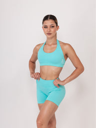 Fit Bunny Gravity безшевен спортен сутиен в син цвят, с висока поддръжка, отворен гръб, и силиконово лого на заек.